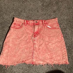 pink bleached jean skirt 💕 size large. front and back pockets. frayed look.